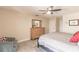Bright bedroom with a king-size bed and an armchair at 69 Sabal Dr, Punta Gorda, FL 33950