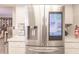 Stainless steel smart refrigerator in modern kitchen at 69 Sabal Dr, Punta Gorda, FL 33950