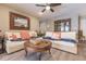 Bright living room features comfy sofas, coffee table, and decorative pillows at 69 Sabal Dr, Punta Gorda, FL 33950