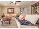 Bright living room features comfy sofas, coffee table, and decorative pillows at 69 Sabal Dr, Punta Gorda, FL 33950