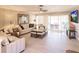 Bright living room with light flooring and comfortable furniture at 69 Sabal Dr, Punta Gorda, FL 33950