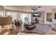 Living area with light wood floors and comfortable seating at 69 Sabal Dr, Punta Gorda, FL 33950