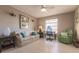 Home office with sofa, chair, and work desk near window at 69 Sabal Dr, Punta Gorda, FL 33950