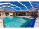 Relaxing pool and patio area, perfect for outdoor entertaining at 69 Sabal Dr, Punta Gorda, FL 33950