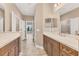 Double vanity bathroom with a large walk-in shower at 11137 Mcdermott Ct, Englewood, FL 34223