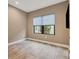 Bright bedroom with large window and tile floors at 11137 Mcdermott Ct, Englewood, FL 34223