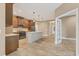Modern kitchen with stainless steel appliances and an island at 11137 Mcdermott Ct, Englewood, FL 34223