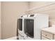 Bright laundry room, featuring a utility sink at 11137 Mcdermott Ct, Englewood, FL 34223