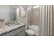 Bright bathroom features granite countertop and updated bathtub at 16098 Highgate St, Port Charlotte, FL 33953