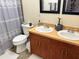 Clean bathroom with double vanity and shower/tub combo at 161 Coblentz St, Port Charlotte, FL 33954