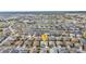 Aerial view of community, showing homes, golf course, and lake at 1766 Dunvegan Dr, Punta Gorda, FL 33980