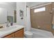 Clean bathroom with a tub shower combination and updated vanity at 1766 Dunvegan Dr, Punta Gorda, FL 33980