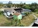 Overhead view of house, pool, shed and dock on the canal at 18345 Ohara Dr, Port Charlotte, FL 33948