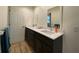 Modern bathroom with double vanity and white quartz countertop at 18345 Ohara Dr, Port Charlotte, FL 33948