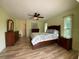 This bedroom offers a ceiling fan and coordinating wood furniture at 18345 Ohara Dr, Port Charlotte, FL 33948