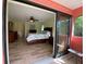 The bedroom has direct access to a patio with sliding glass doors at 18345 Ohara Dr, Port Charlotte, FL 33948