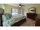 Spacious bedroom with king-size bed and access to patio and pool at 18345 Ohara Dr, Port Charlotte, FL 33948