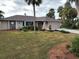 Single story home with stone accents and mature landscaping at 18345 Ohara Dr, Port Charlotte, FL 33948