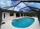 Enjoy this beautiful screened-in pool at 18345 Ohara Dr, Port Charlotte, FL 33948