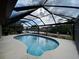 Amazing pool with screened enclosure and canal view at 18345 Ohara Dr, Port Charlotte, FL 33948