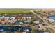 Aerial view of canal front home with pool and spacious backyard at 210 Divinci Dr, Punta Gorda, FL 33950