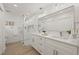Modern bathroom with double vanity and glass shower at 210 Divinci Dr, Punta Gorda, FL 33950