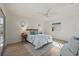 Comfortable bedroom with a queen-size bed and wood accents at 210 Divinci Dr, Punta Gorda, FL 33950