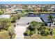 A charming single-Gathering home with an attached garage and a lush, tropical landscaped yard at 210 Divinci Dr, Punta Gorda, FL 33950