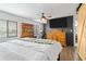 Main bedroom with king bed, dresser, and barn door at 2820 Marlin Court, Punta Gorda, FL 33950