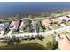 Aerial view of waterfront homes, showcasing their pools and landscaping at 2895 Mill Creek Rd, Port Charlotte, FL 33953