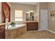 Bathroom features a corner soaking tub and double vanity at 2895 Mill Creek Rd, Port Charlotte, FL 33953