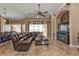 Spacious living room with leather sectional and water view at 2895 Mill Creek Rd, Port Charlotte, FL 33953