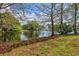 Scenic lake view with lush vegetation and tranquil atmosphere at 4178 Central Sarasota Pkwy # 326, Sarasota, FL 34238