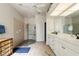 Spacious bathroom with a walk-in shower and double vanity at 500 Andora Dr, Punta Gorda, FL 33950