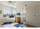 Bathroom with double sinks, soaking tub, and separate shower at 500 Andora Dr, Punta Gorda, FL 33950