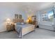 Light and airy bedroom with a comfortable bed and window seat at 500 Andora Dr, Punta Gorda, FL 33950