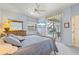 Main bedroom with pool view and sliding glass doors at 500 Andora Dr, Punta Gorda, FL 33950