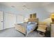 Bedroom with light blue walls and a comfortable sitting area at 500 Andora Dr, Punta Gorda, FL 33950