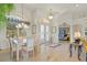 Open concept dining area with views into living room and kitchen at 500 Andora Dr, Punta Gorda, FL 33950