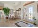 Bright dining room features a table for six and built-in cabinetry at 500 Andora Dr, Punta Gorda, FL 33950