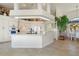Spacious kitchen featuring a large island and white cabinetry at 500 Andora Dr, Punta Gorda, FL 33950