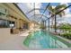 Screened-in pool and lanai overlooking the canal at 500 Andora Dr, Punta Gorda, FL 33950