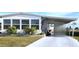 Charming single-story home with covered parking and well-maintained landscaping at 525 Parkwood Ave, North Port, FL 34287