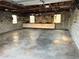 Spacious two-car garage with built-in cabinets and shelving at 627 Palm Ave, Punta Gorda, FL 33950