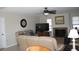 Bright living room featuring a fireplace and large TV at 723 Via Formia, Punta Gorda, FL 33950