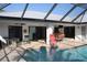 Enjoy this covered lanai and refreshing pool at 723 Via Formia, Punta Gorda, FL 33950