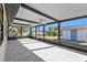 Bright screened porch, tile floor, and ceiling fans at 951 Webster Nw Ave, Port Charlotte, FL 33948