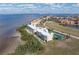 Aerial view showing the community, tennis courts, and waterfront location at 101 N Marion Ct # 225, Punta Gorda, FL 33950