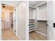 View of a bathroom and a walk-in closet at 101 N Marion Ct # 225, Punta Gorda, FL 33950