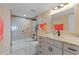 Updated bathroom with a walk-in shower, new vanity, and modern fixtures at 101 N Marion Ct # 225, Punta Gorda, FL 33950
